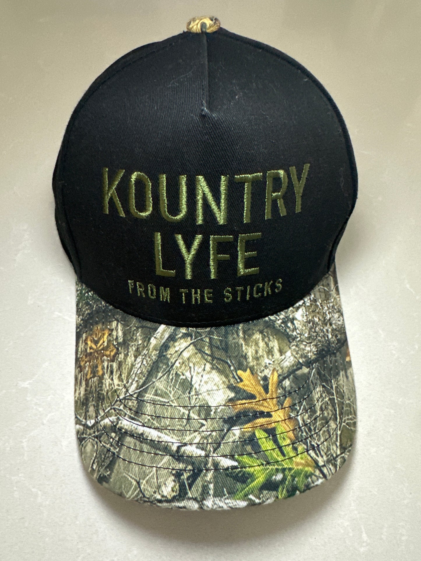 Kountry Lyfe “Midnight Timber” Trucker Hat – Black & Camo Edition