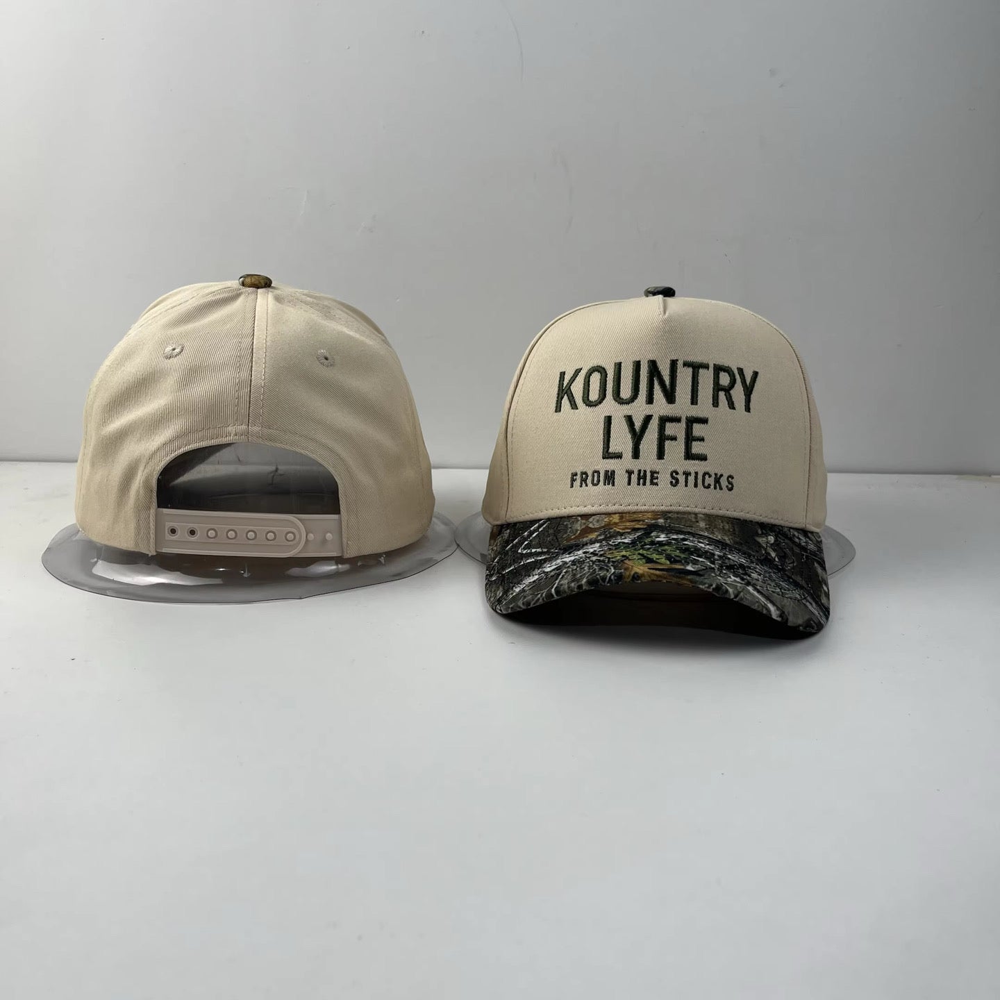 Kountry Lyfe “From The Sticks” Camo Trucker Hat